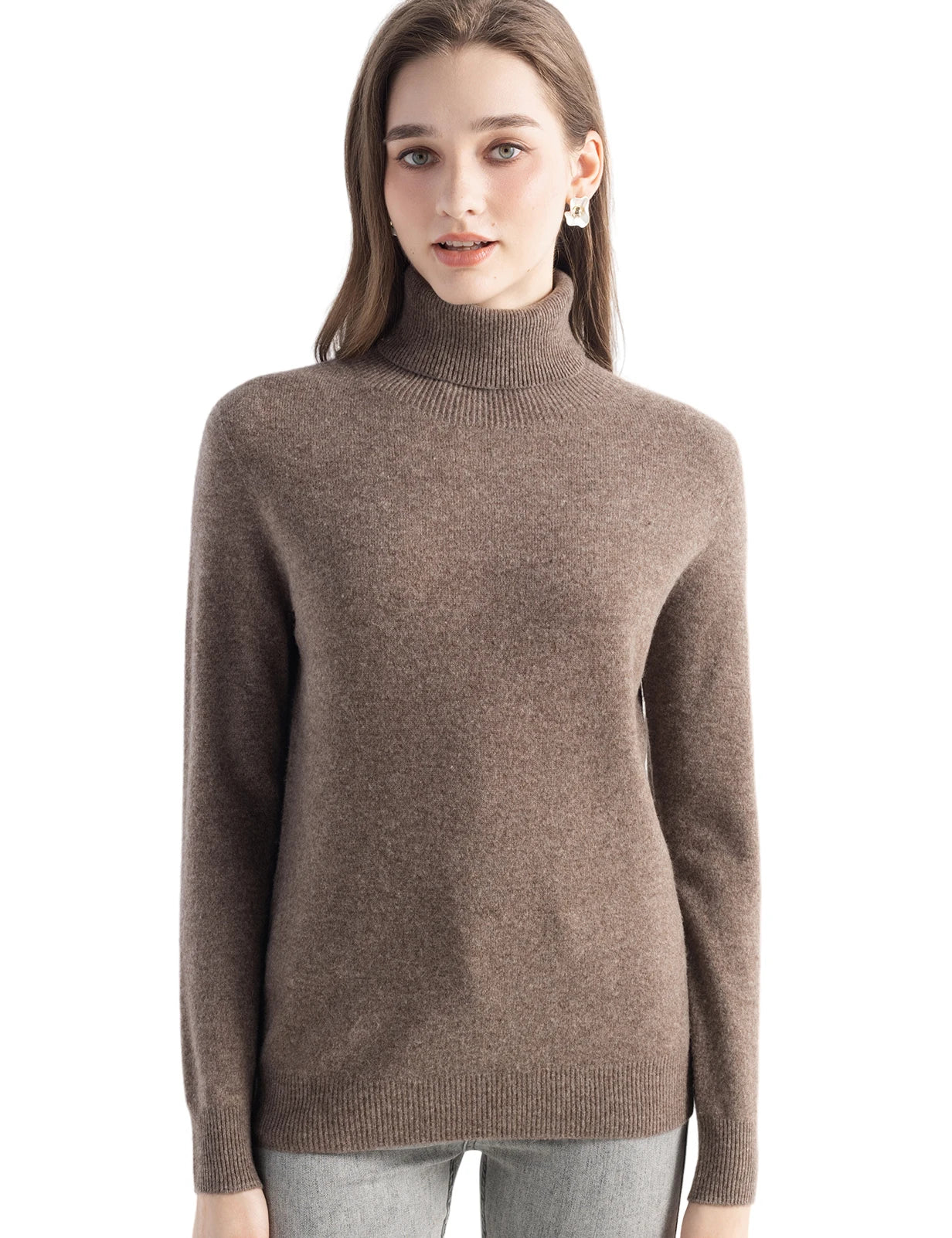 A soft taupe-colored women merino wool turtleneck sweater with fine knit texture and ribbed cuffs.