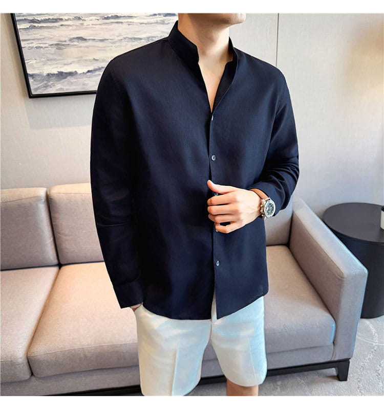 Dark navy blue men’s linen long-sleeved button-up shirt with a mandarin collar.