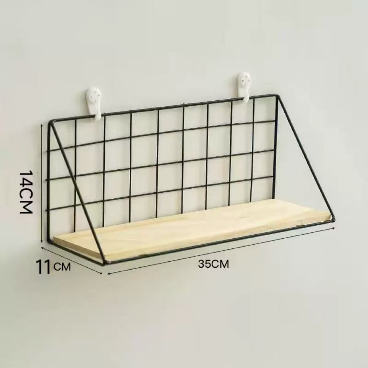 wood wall shelf with wire basket storage featuring a black metal grid frame and a light wood plank mounted on the wall.