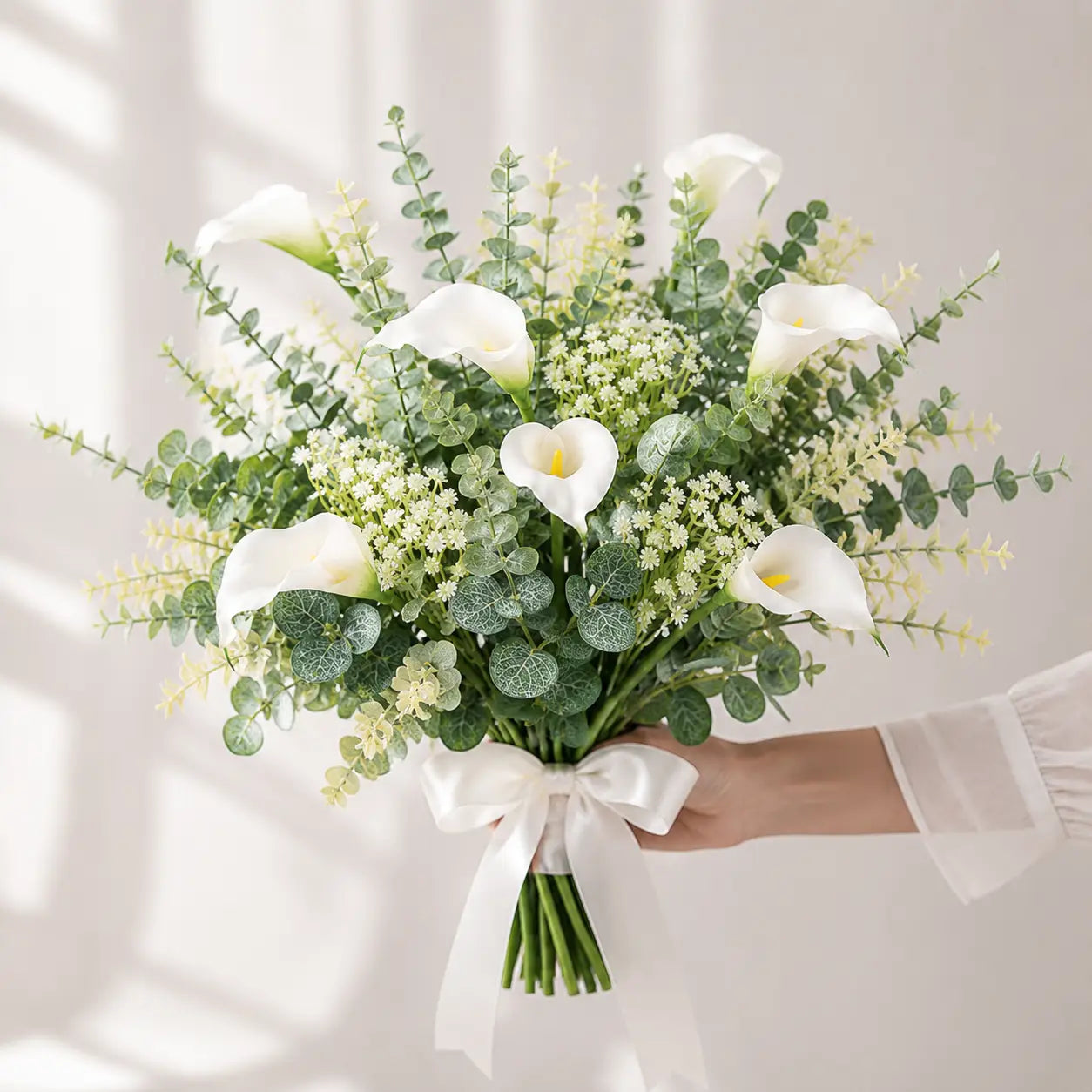 elegant white calla lily and eucalyptus bouquet tied with a satin ribbon from artificial mixed flowers mixed flowers 48pcs collection for wedding decor.