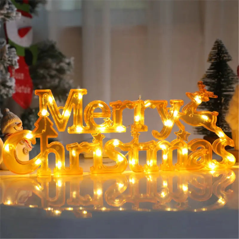 トナカイのデザインを特徴とする、LEDの“メリークリスマス”レターライトのストリングガーランド。華やかな装飾に最適です。