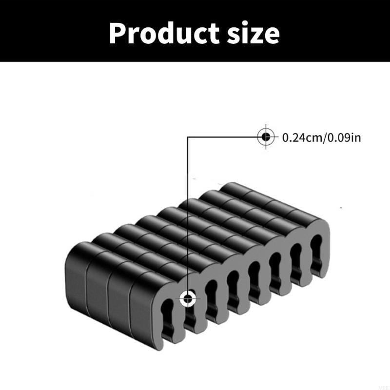 Black cylindrical magnetic clasps with a smooth uniform surface and 0.24cm diameter in a pc cable comb set acrylic wire management tool.