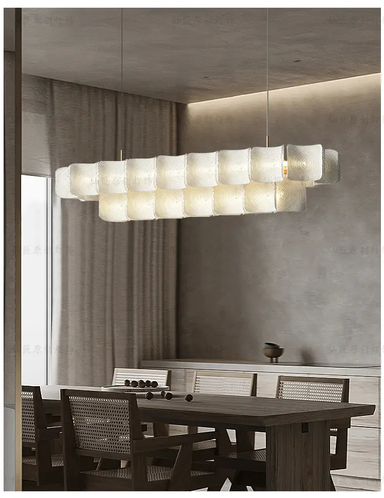Minimalist wabi sabi led chandelier pendant light featuring a modern white textured glass with a sleek segmented design.