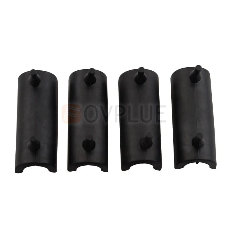 black plastic pipe couplings with rounded ends and two circular holes each for harley touring saddlebag support grommet kit 1993 up