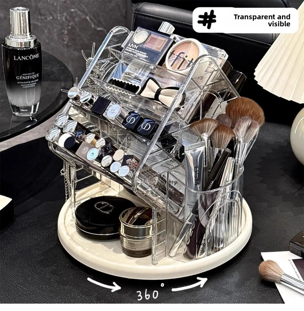 Cet organisateur de maquillage en acrylique transparent rotatif se distingue par une conception à plusieurs niveaux et une base rotative à 360 degrés, pour un rangement pratique des cosmétiques.