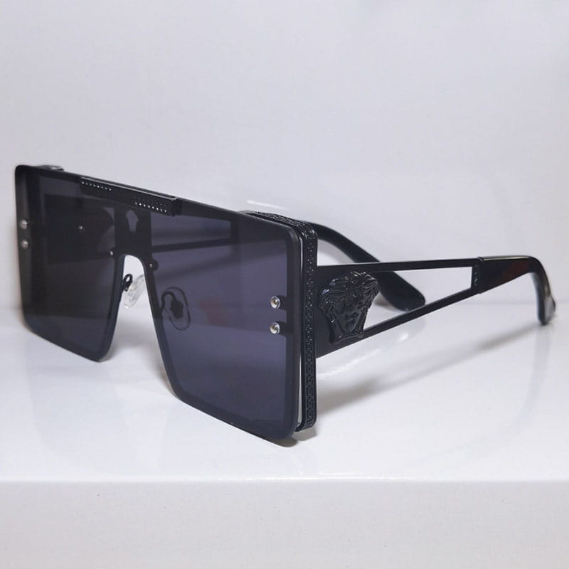 Black Versace polarized oversized metal sunglasses for adults featuring bold square frames, dark gray lenses, and an embossed Medusa head on the temple.