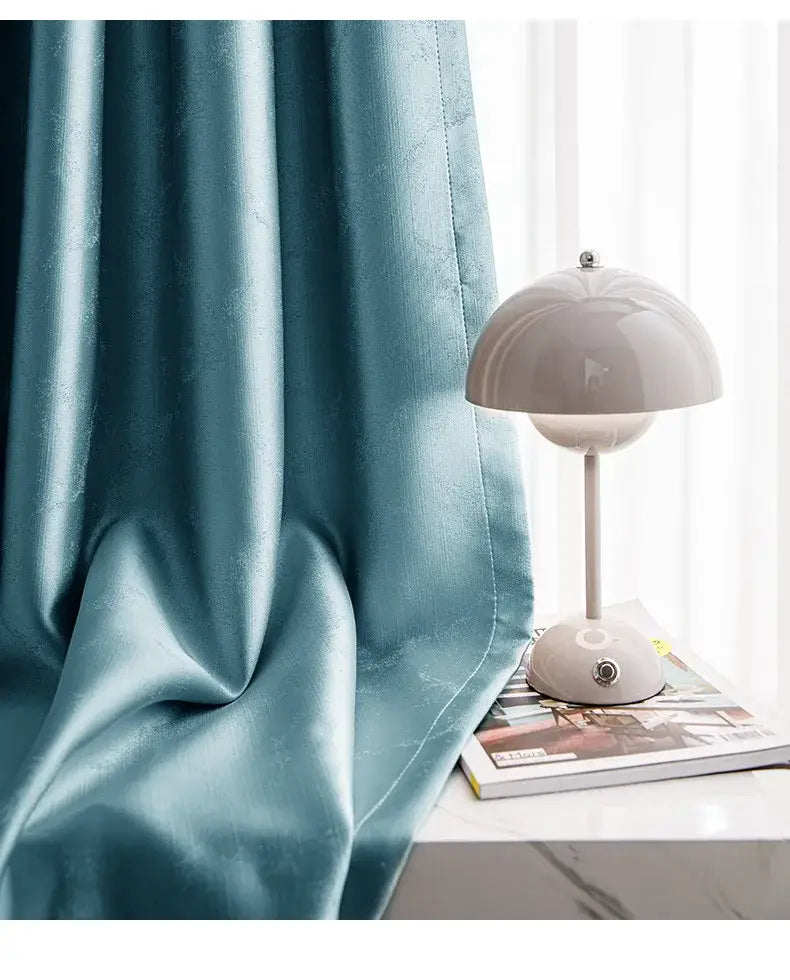 Teal velvet living room curtains with a subtle textured pattern and tassel tieback beads custom blackout drapes para la sala.