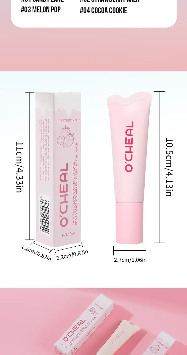 Pink ocheal strawberry milk flavored hydrating fruit flavored glossy lip balm in a sleek glossy pink tube with matching packaging.