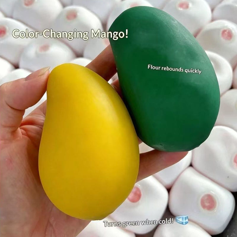 jouets antistress souples en forme de mangue, jaune et verte, changeant de couleur, vus de face, comme objets de soulagement du stress pour une fête d’anniversaire
