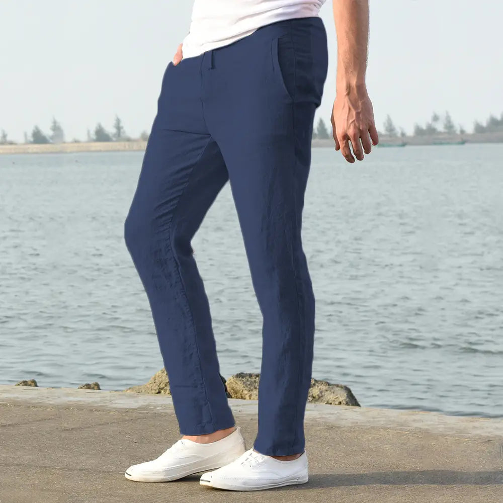Navy blue men cotton linen trousers with a slim fit and subtle texture breathable casual pants.