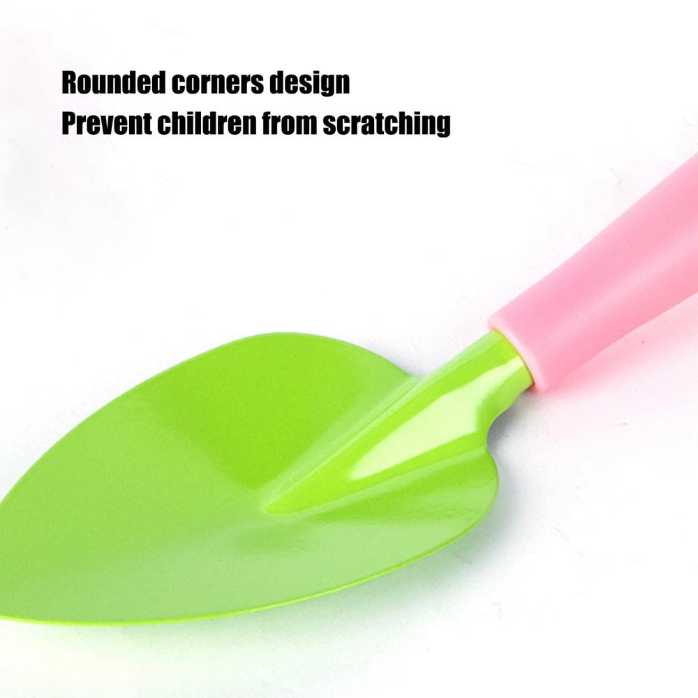 Bright green plastic garden trowel with a soft pink handle and rounded corners from a kids gardening set with tools and watering for children.