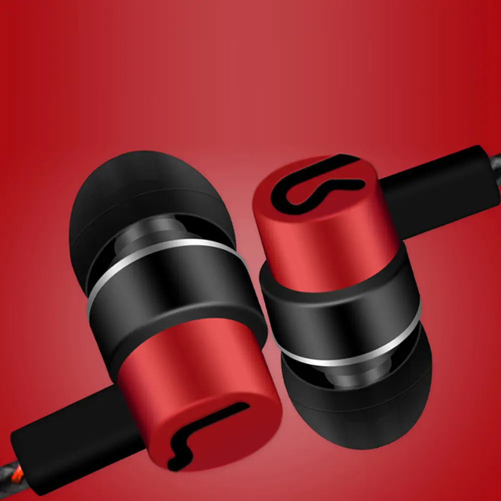 Red and black in-ear wired headphones with a sleek metallic finish and distinctive curved logo on the earpiece featuring bass stereo effect and volume control.
