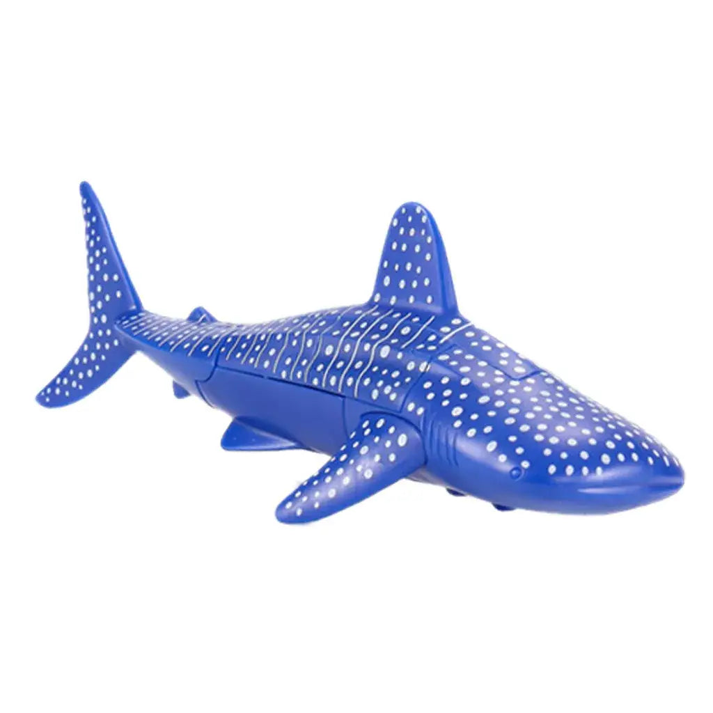blue plastic whale shark toy with white polka dots featured as finished goods in the shark transforming robot toy collection