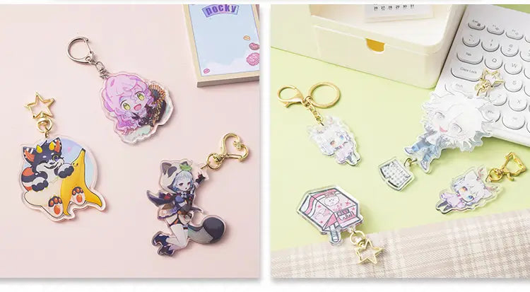 Clear acrylic keychains featuring colorful anime-style characters with gold-colored metal clasps and hooks for personalized cartoon charm customization.