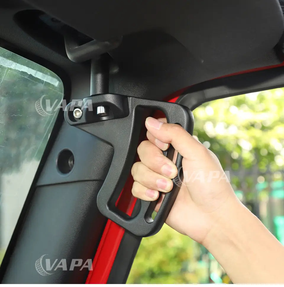 Türgriff für den Jeep Wrangler JK aus schwarzem Kunststoff und Aluminium mit rotem Innenbesatz, von der Rückseite dargestellt.