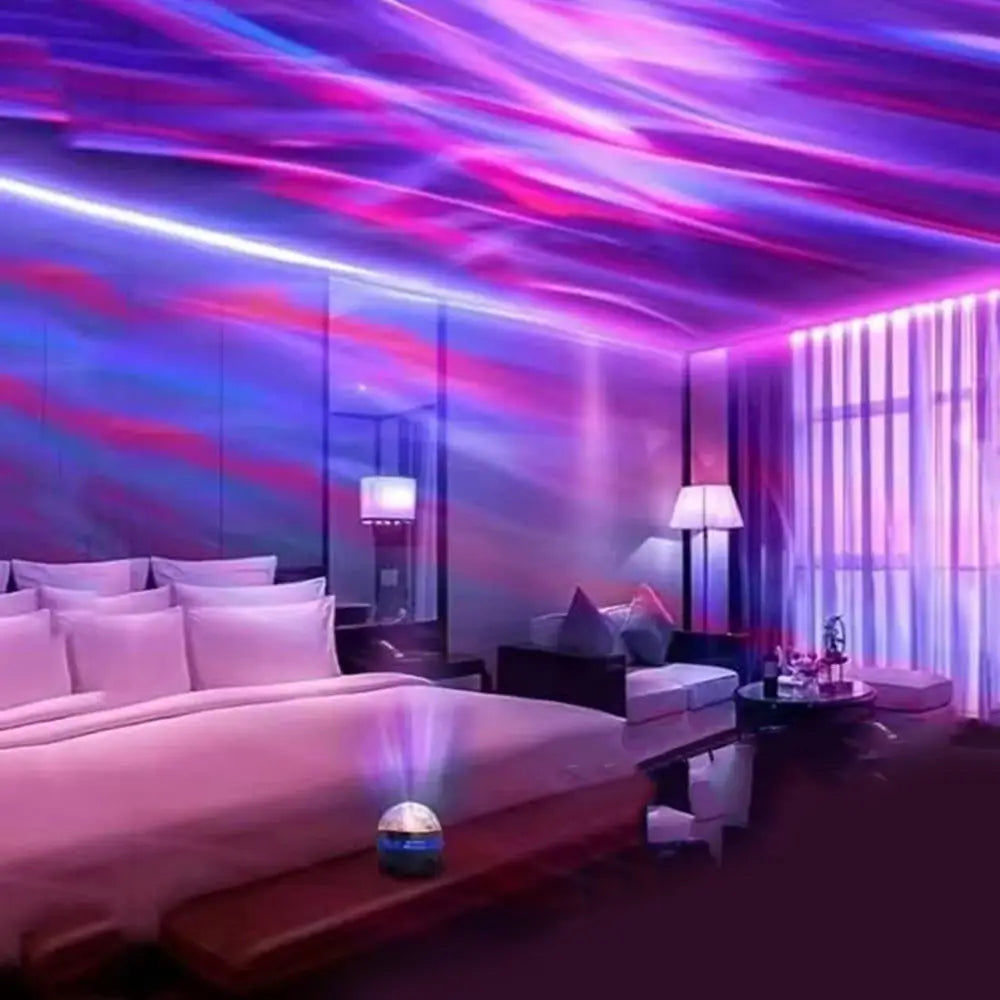 Un projecteur compact sphérique à DEL de ciel étoilé, avec une finition brillante bleu et blanc, projetant des motifs lumineux violets, roses et bleus vibrants sur le plafond pour des veilleuses.