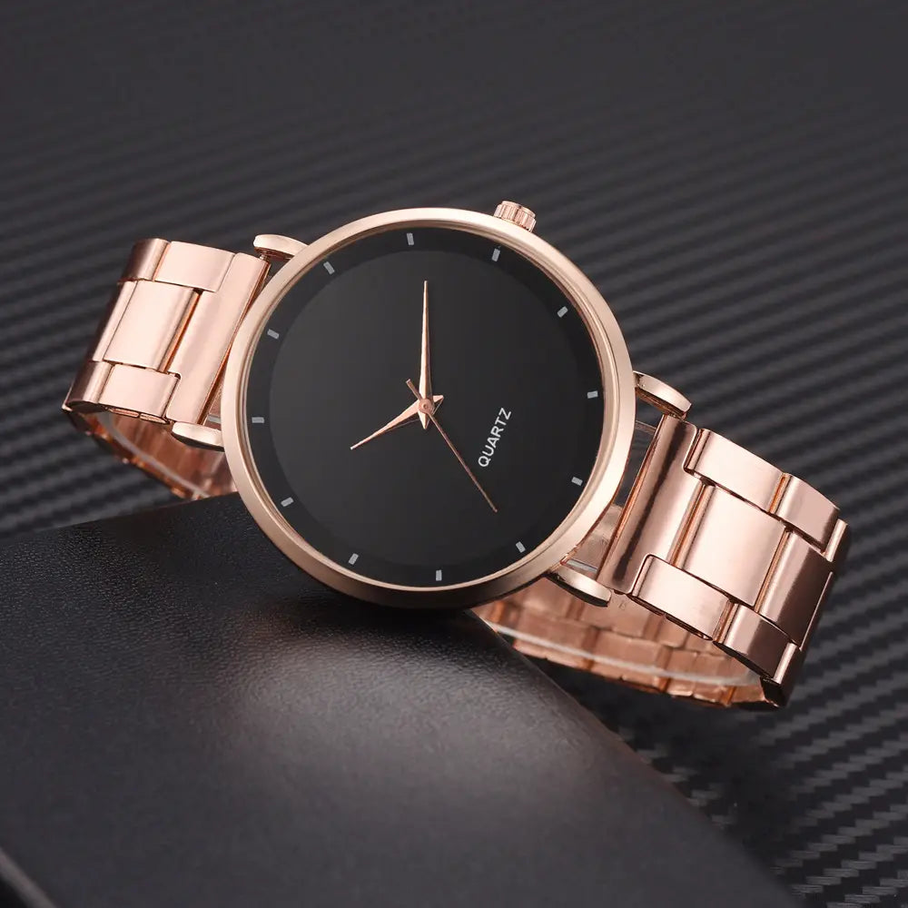Rose gold women luxury quartz wristwatch with a sleek black dial and minimalist design for business use.
