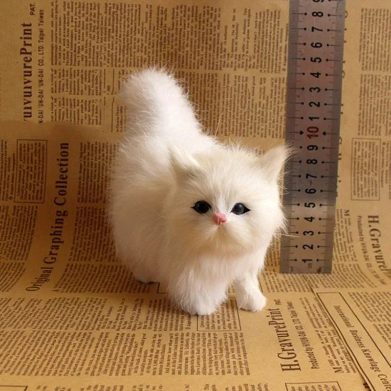a fluffy white simulation cat plush figurine with black eyes and a pink nose soft stuffed animal toy