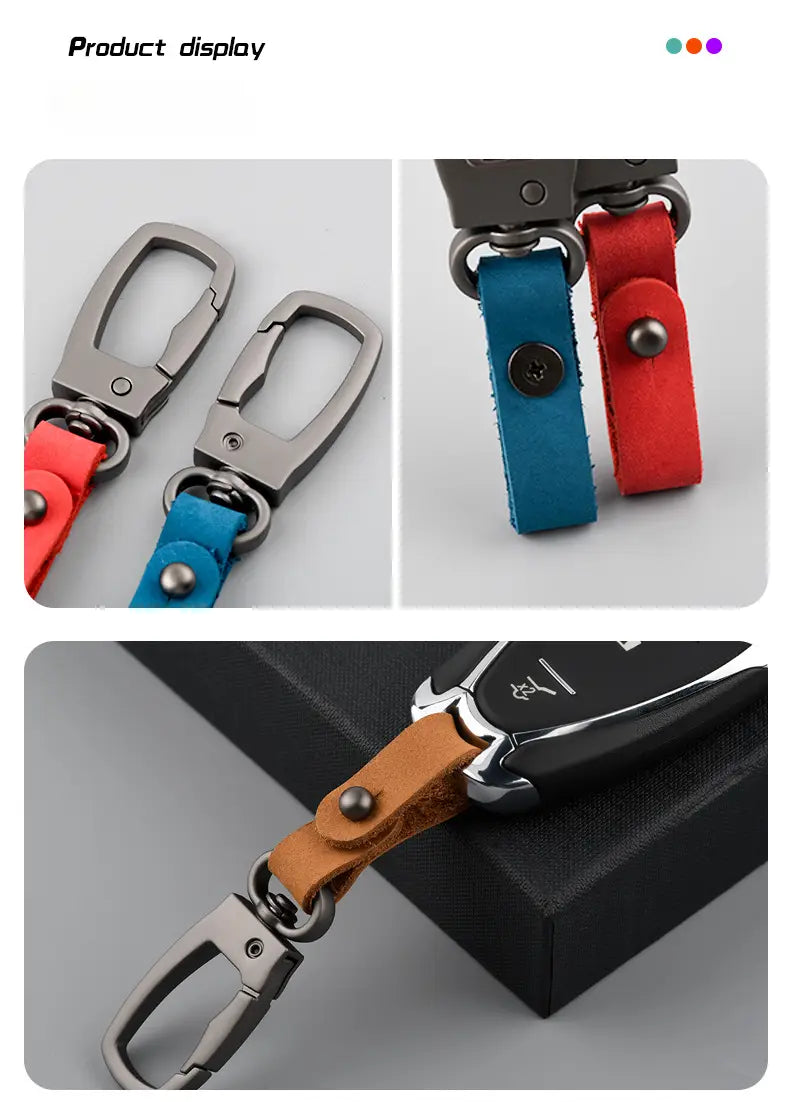 A sleek silver-toned metal leather keychain car key holder organizer charm with a sturdy clip and attached vibrant red blue or tan leather straps.