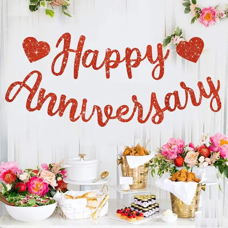 Red glittery happy anniversary banner with heart accents for party decoration glitter sign.