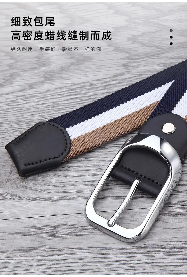 A navy white and tan striped canvas web stripe belt for men featuring a black leather buckle and silver-toned metal hardware for casual use.