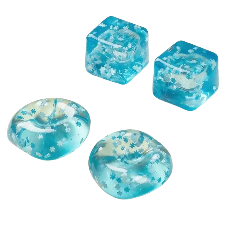 Blue translucent snowflake ice cube stress relief toy with embedded white flower patterns viewed from the front