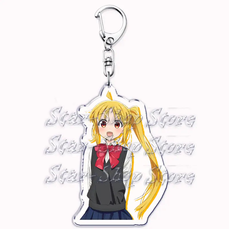 clear acrylic keychain featuring an anime girl with long blonde pigtails wearing a black school uniform top and red bow tie from bocchi the rock.