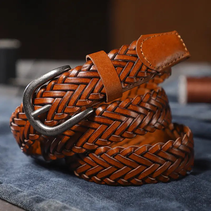 braided brown leather belt unisex casual woven accessory featuring a brown woven leather design with a silver toned buckle.