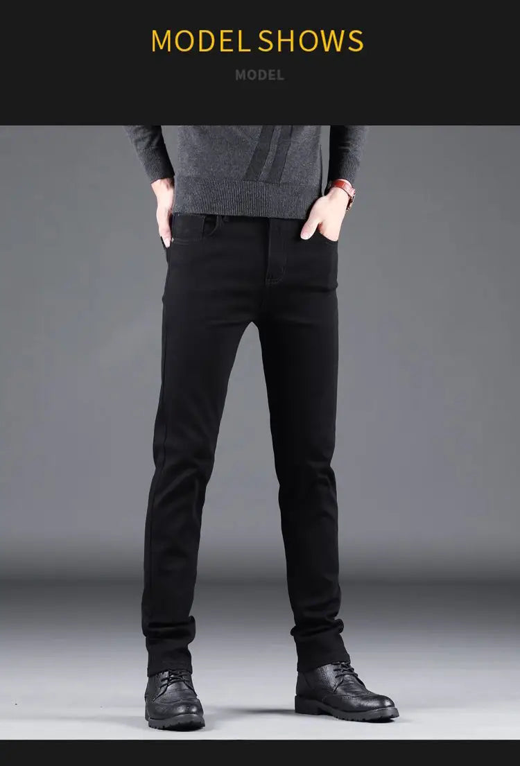 men black slim fit stretch denim jeans displayed from the back side showing the slim fit design and stretchable black denim material