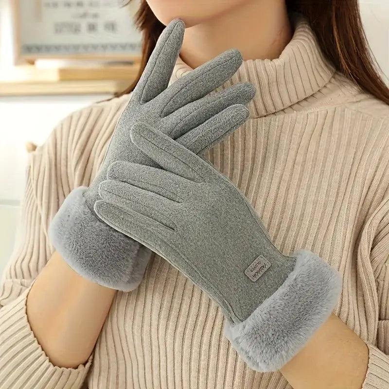 Gray women winter touchscreen gloves with plush fuzzy cuffs and a soft fleece lined windproof fabric body.