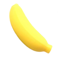 A bright yellow banana-shaped slow rising squishy toy rests on green palm fronds in a top view
