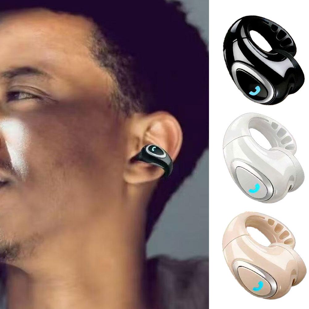 A black sleek and glossy open ear clip on wireless bluetooth earbud with a distinctive curved design featuring an illuminated blue logo on its front.