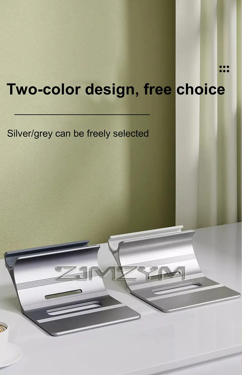 Silver and grey two-tone aluminum laptop stand with a sleek minimalist design and adjustable desk holder for ergonomic use.
