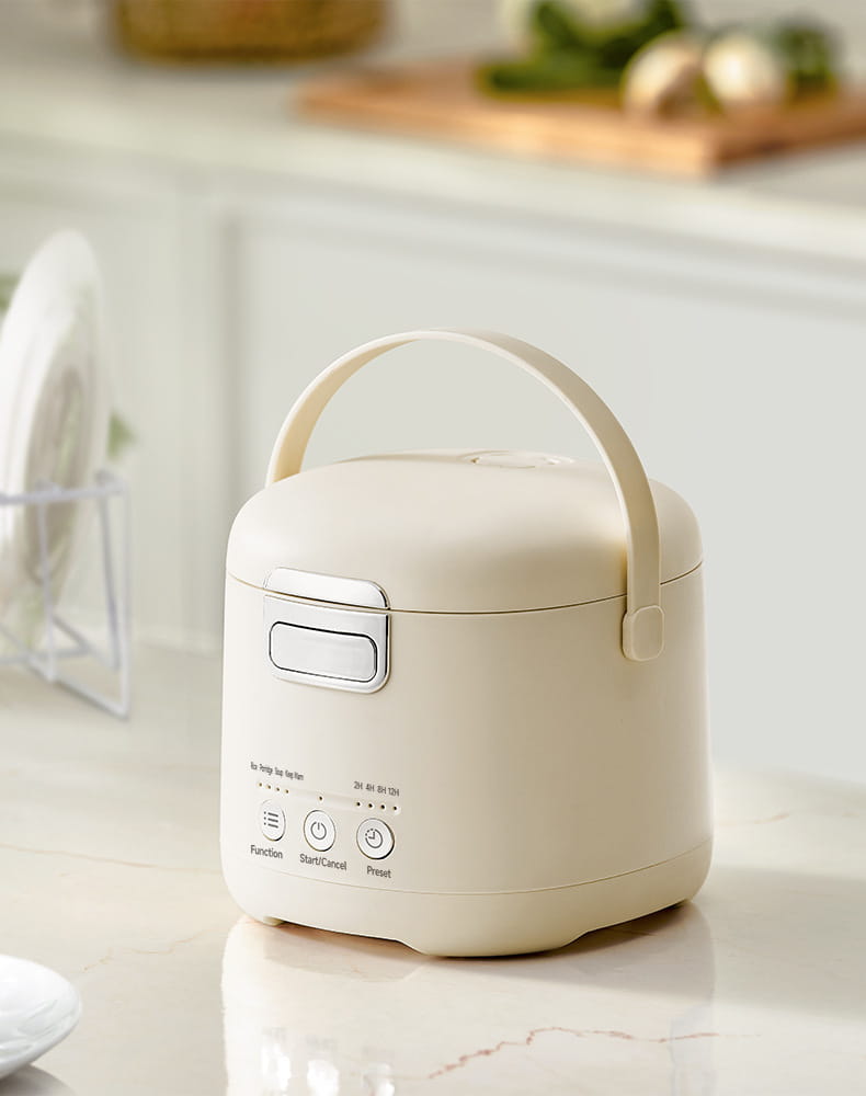 Zemkon 1,2-l Smart-Elektro-Reiskocher in Creme mit kompaktem Design, elegantem Griff und minimalistischem Bedienfeld für effizientes Garen.