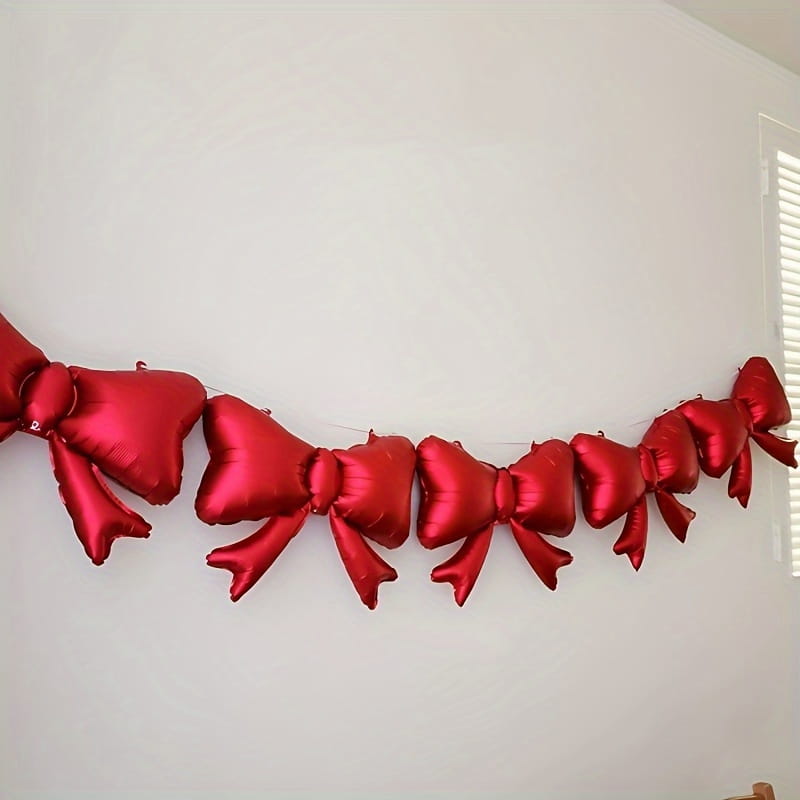 une guirlande décorative composée de 8 ballons rouges métalliques brillants en forme de nœud, pour la décoration de mariage, d’anniversaire, de soirée entre filles, pour la Saint-Valentin et pour les props de photographie d’événements festifs