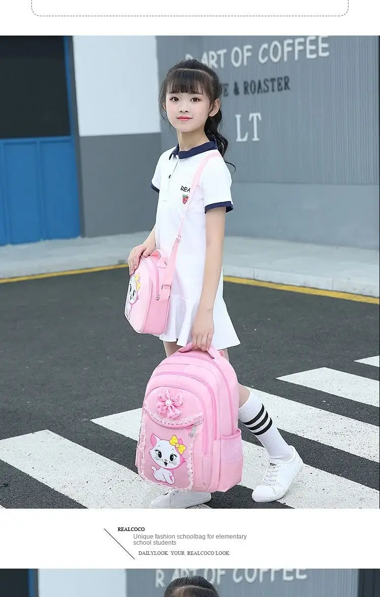 Rosa Katzen-Schulrucksack-Set für Mädchen mit einem rosa Cartoon-Rucksack mit Katzendesign und dekorativer Schleife.