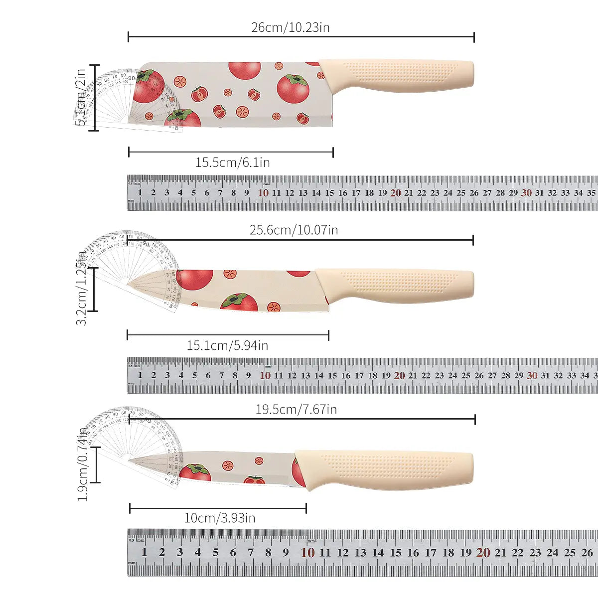 Set of three ceramic kitchen knives with beige handles and blades featuring a red tomato pattern.