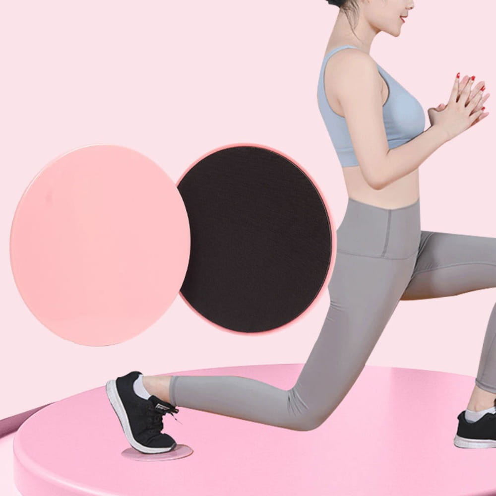 pink and black circular core sliders fitness gliding discs made of smooth plastic for abdominal training exercises