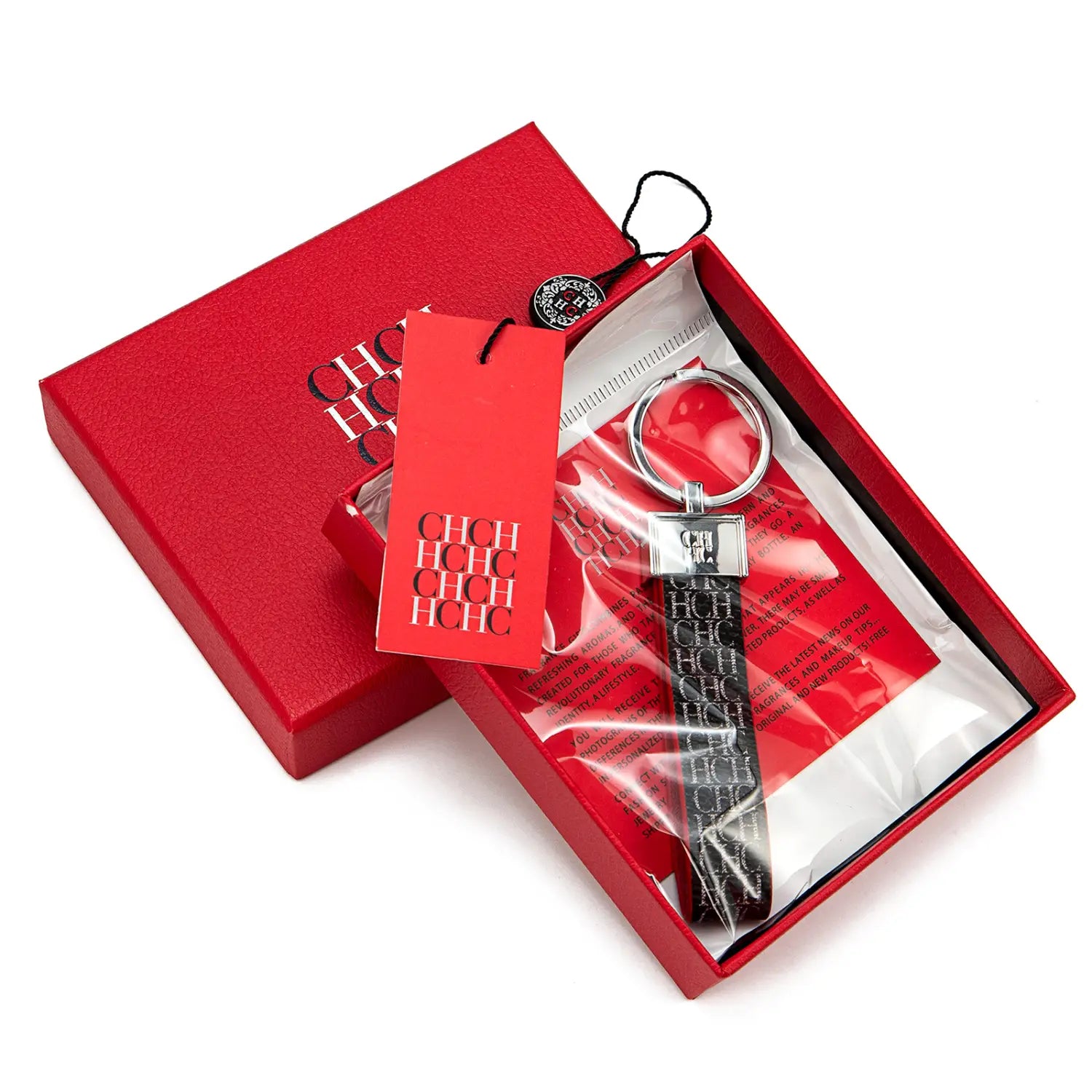 Black leather keychain with silver-toned metal ring and rectangular plaque featuring a repeating chch logo pattern designed as a fashion accessory gift.