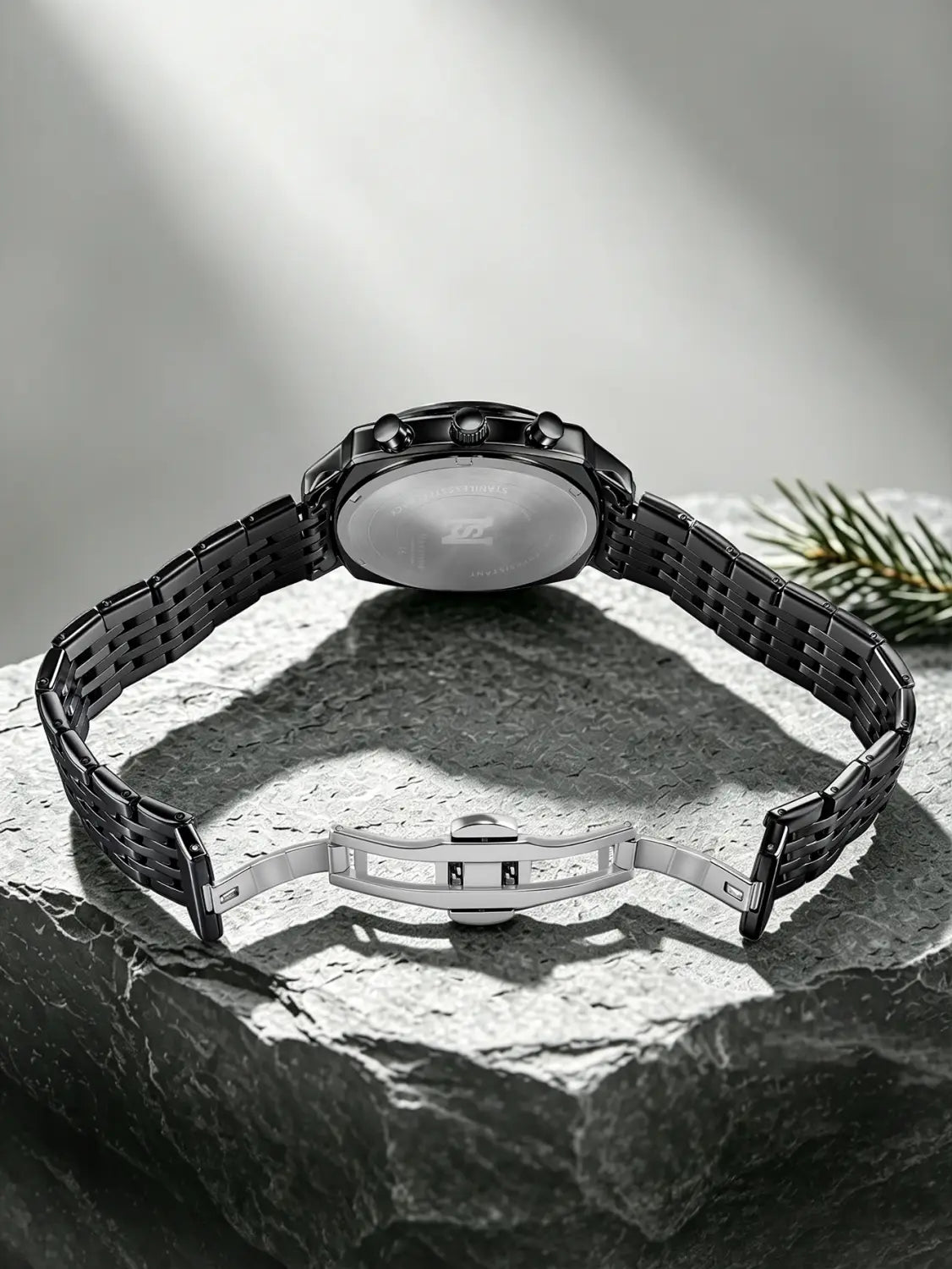 Men’s stainless steel chronograph watch featuring a black ceramic dial with a sleek interlocking link bracelet and polished silver-tone clasp.