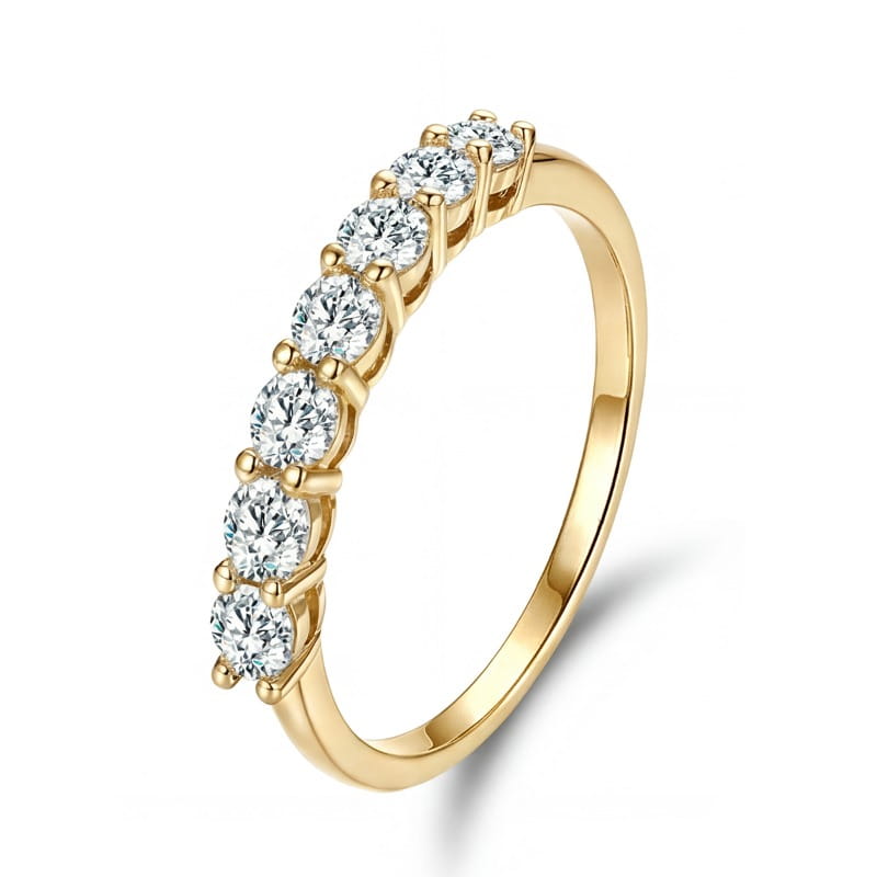 Sterling silver zircon ring for women with a gold band featuring five round-cut clear stones in a sleek elegant design.
