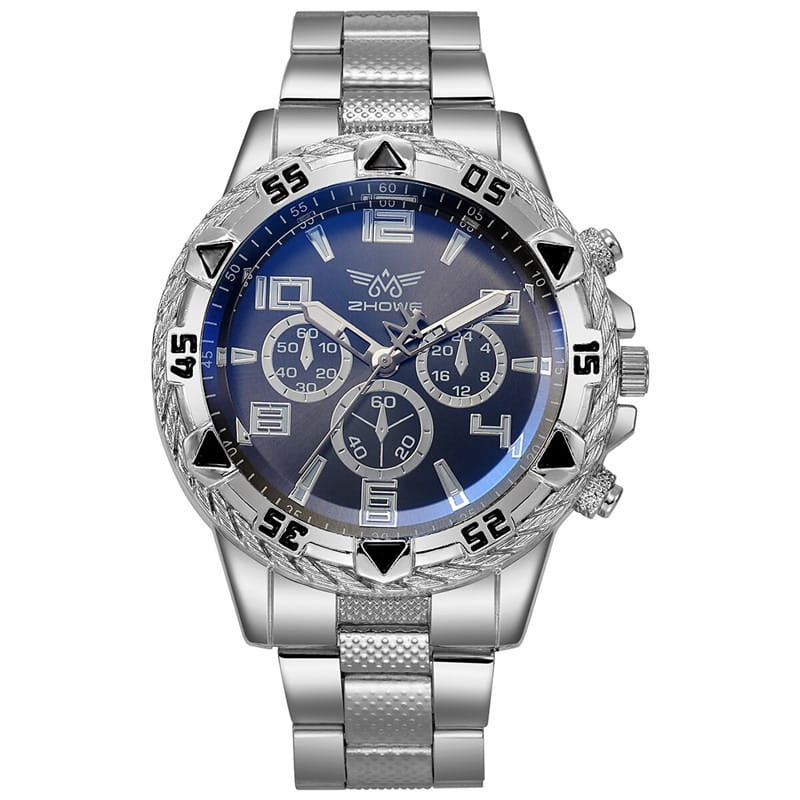 Montre à quartz à chronographe en acier inoxydable Tvk avec un boîtier en acier inoxydable argenté, un cadran bleu foncé, des marqueurs horaires triangulaires noirs, et trois sous-cadrans.