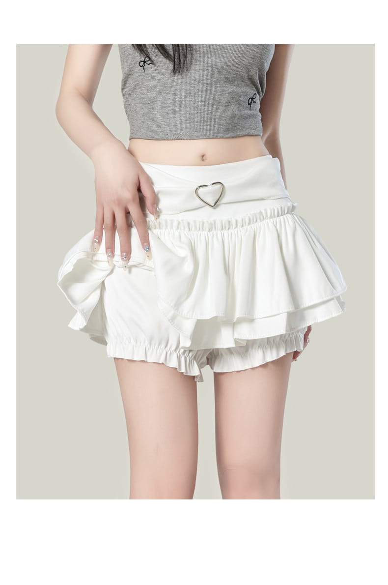 White ruffled high waist mini skirt with a heart-shaped metal belt buckle in Y2k style.