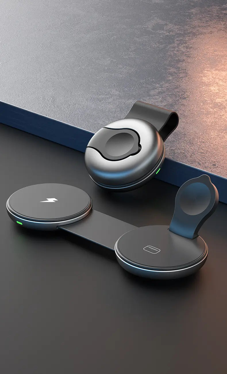 Foldable 3-in-1 magnetic wireless charger in silver and black with a sleek modern design featuring two circular charging pads connected by a central bar.