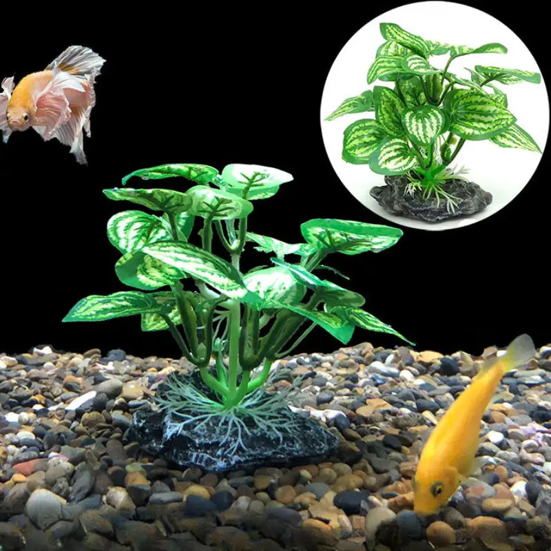 Green artificial water plant with variegated leaf patterns and a black rocky base for fish tank landscape decoration.
