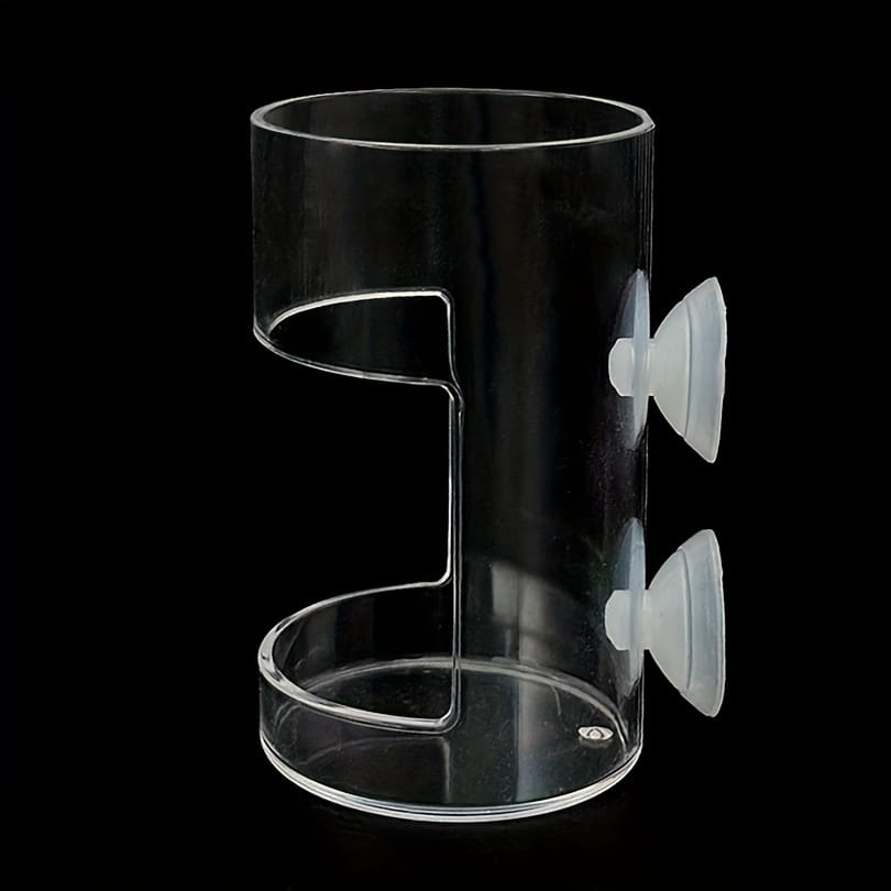 Anneau d’alimentation flottant cylindrique en acrylique transparent pour poissons, muni de deux ventouses blanches sur le côté, pour utilisation dans un aquarium.