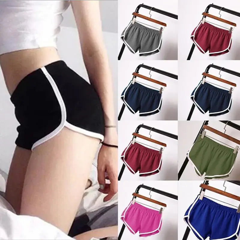 Black sports shorts women with white trim featuring an elastic waist designed for casual athletic use
