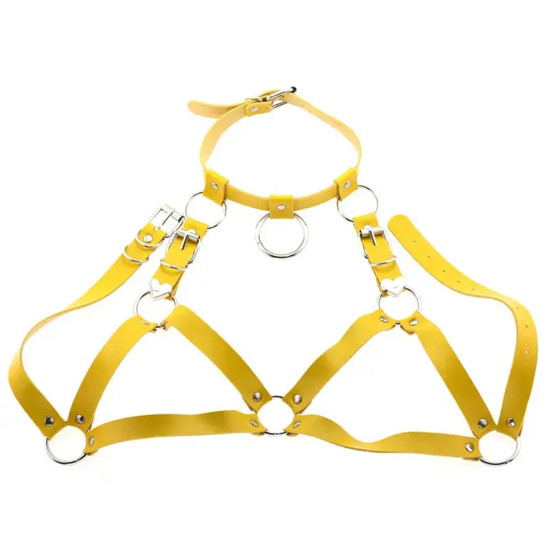 yellow leather goth body harness with silver metal rings and heart-shaped clasps designed as body jewelry for black goth body styles