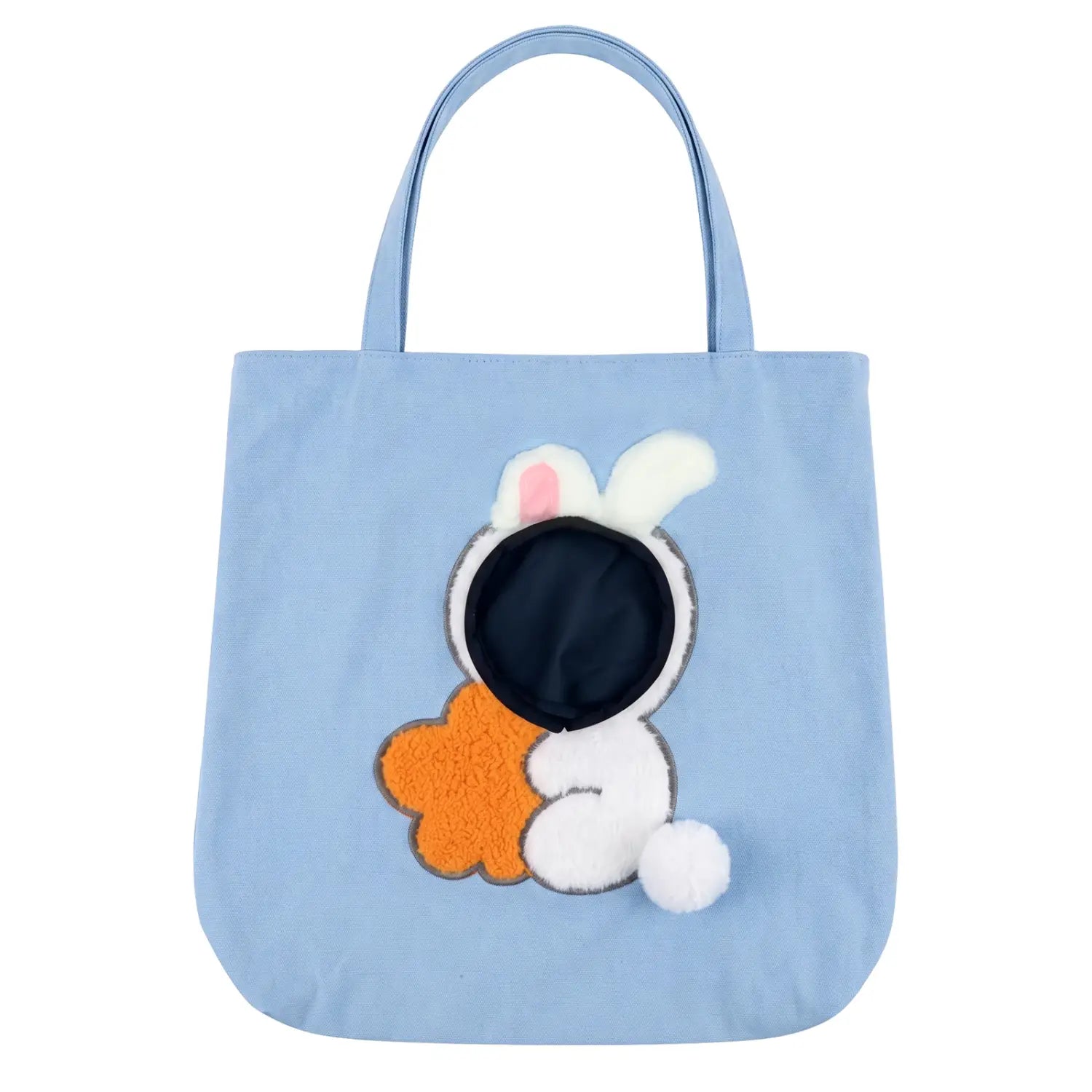 Sac de voyage en toile bleu clair pour petits chiens, avec un lapin blanc en peluche aux oreilles roses et une boucle de sécurité pour un transport sûr de l’animal.