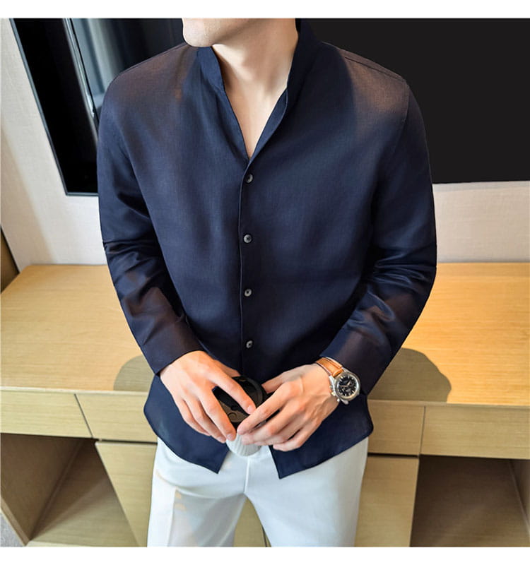 Dark navy men’s linen mandarin collar shirt with long sleeves and button-down front.